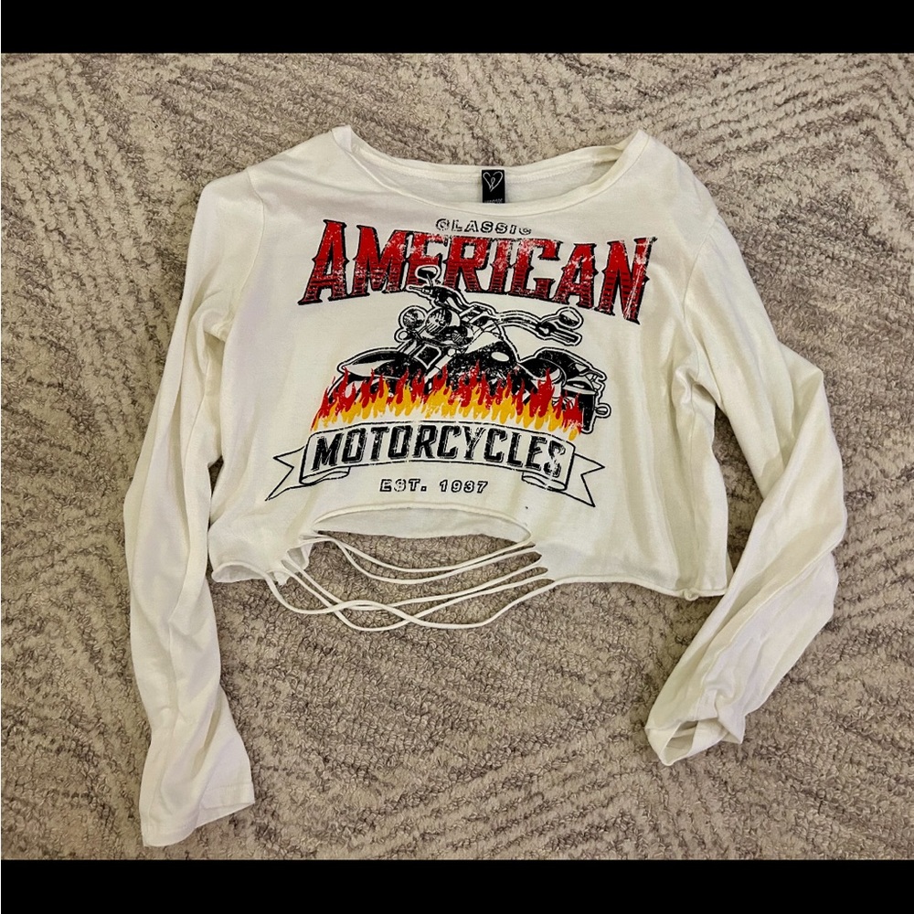 Very cool long sleeve shirt with rips in the front